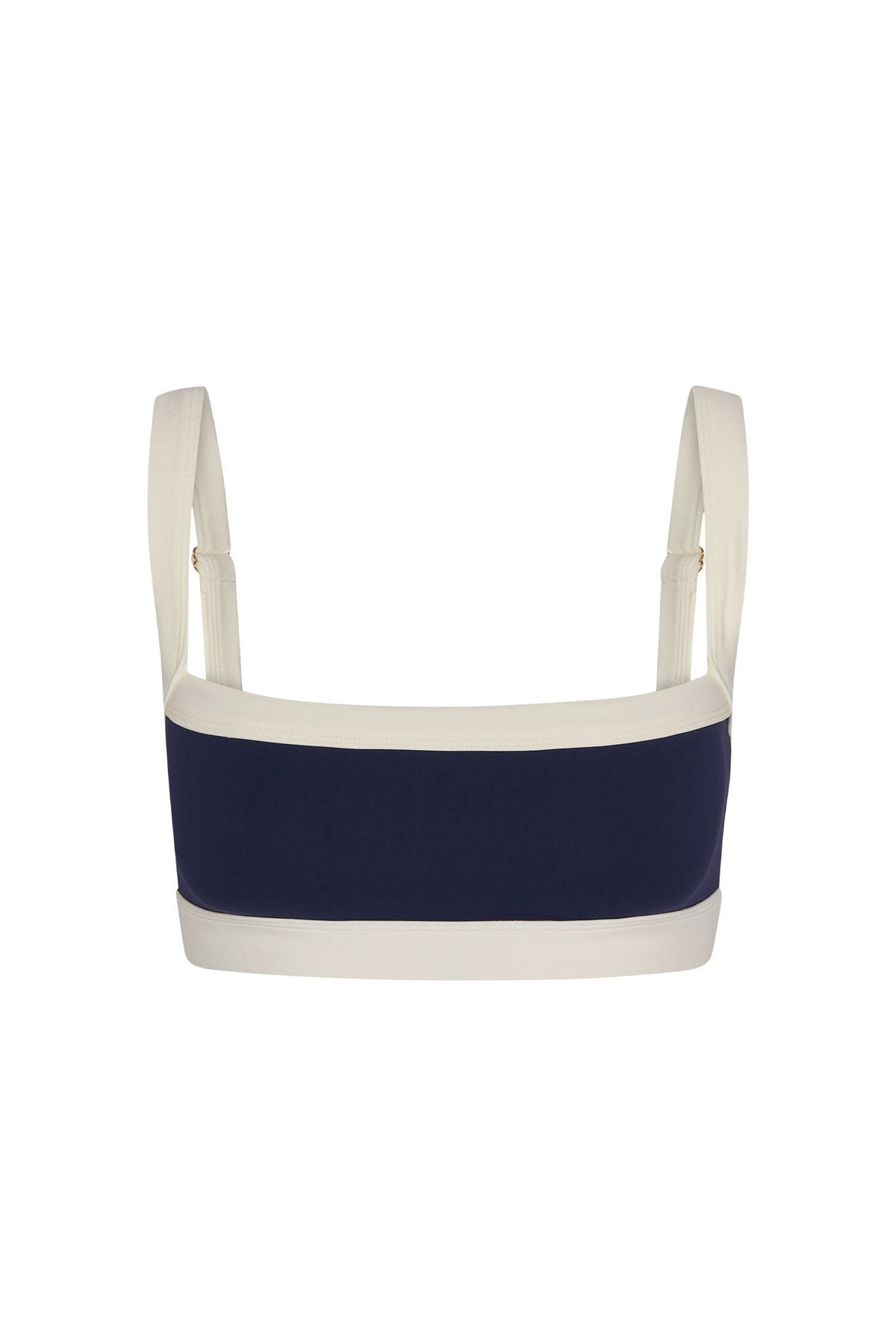 Front view of Outpost Bra with square neckline, midnight navy center and ivory trim, adjustable straps on white